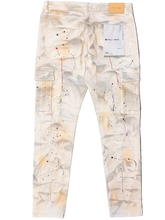 Load image into Gallery viewer, White pants with pattern on a gray surface
