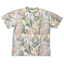 Load image into Gallery viewer, Camouflage-patterned t-shirt with a brand logo on a black background
