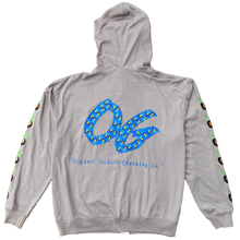 Load image into Gallery viewer, A light gray hoodie laid flat on a textured carpet, featuring a large blue graphic with small yellow stars and vertical text reading 'HOPSCAPE' on the back. The sleeves also have a repeating circular graphic detail.
